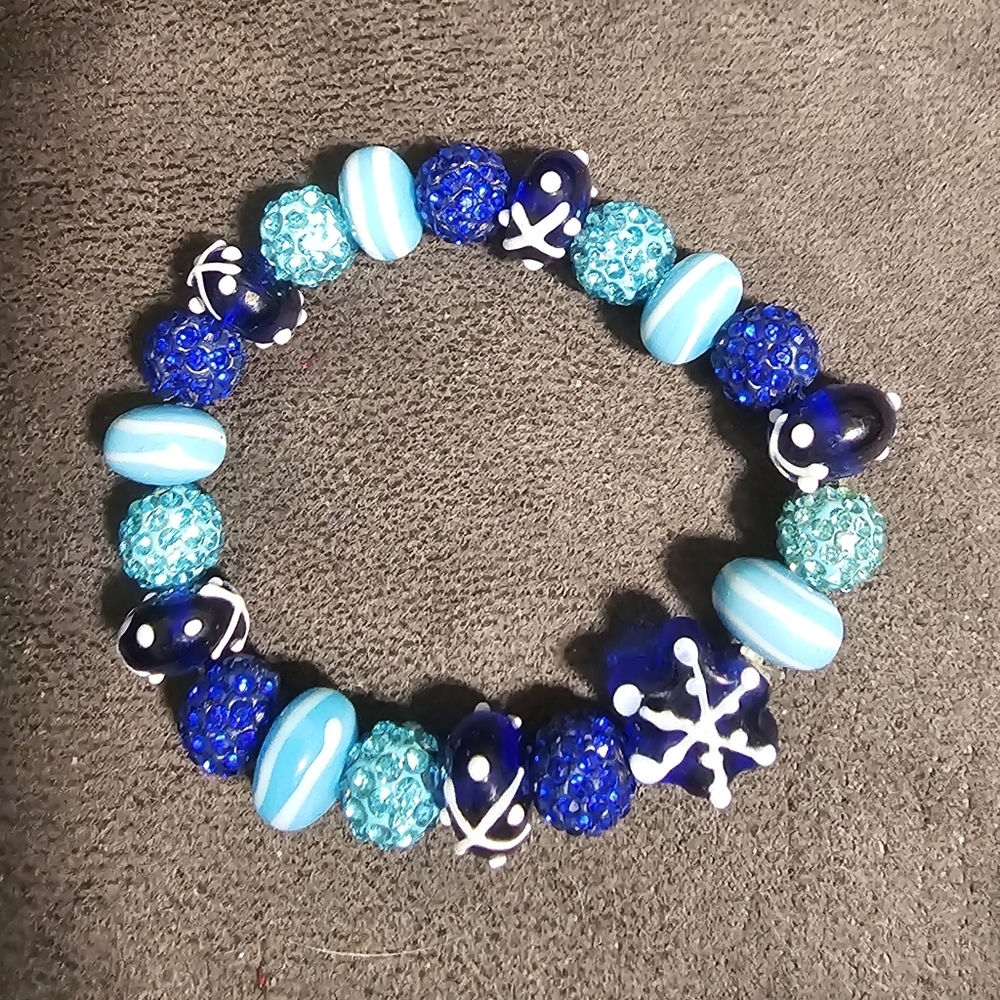 Stretchy blue snowflake bracelet